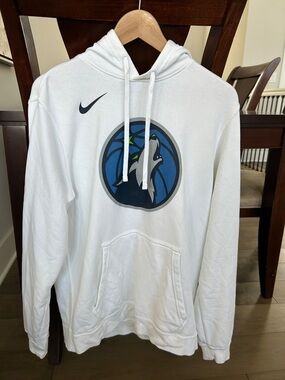 Nike White Hoodie with Blue and Gray Wolf Emblem
See discoloration neck